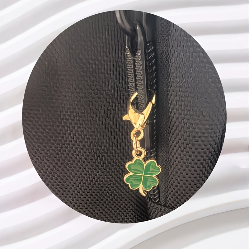 A Sparkling Dreamcatcher Car Pendant - an Exquisite Rearview Mirror Decoration with a Shiny Feather Design - a Car Interior Accessory, Accompanied by Two Four-Leaf Clover Bag Charms - an Ideal Birthday Gift for Elegant Women.