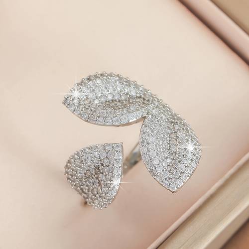 a unique and minimalist clover shaped open end womens ring a fashionable and exquisite copper ring with synthetic zirconia designed for finger