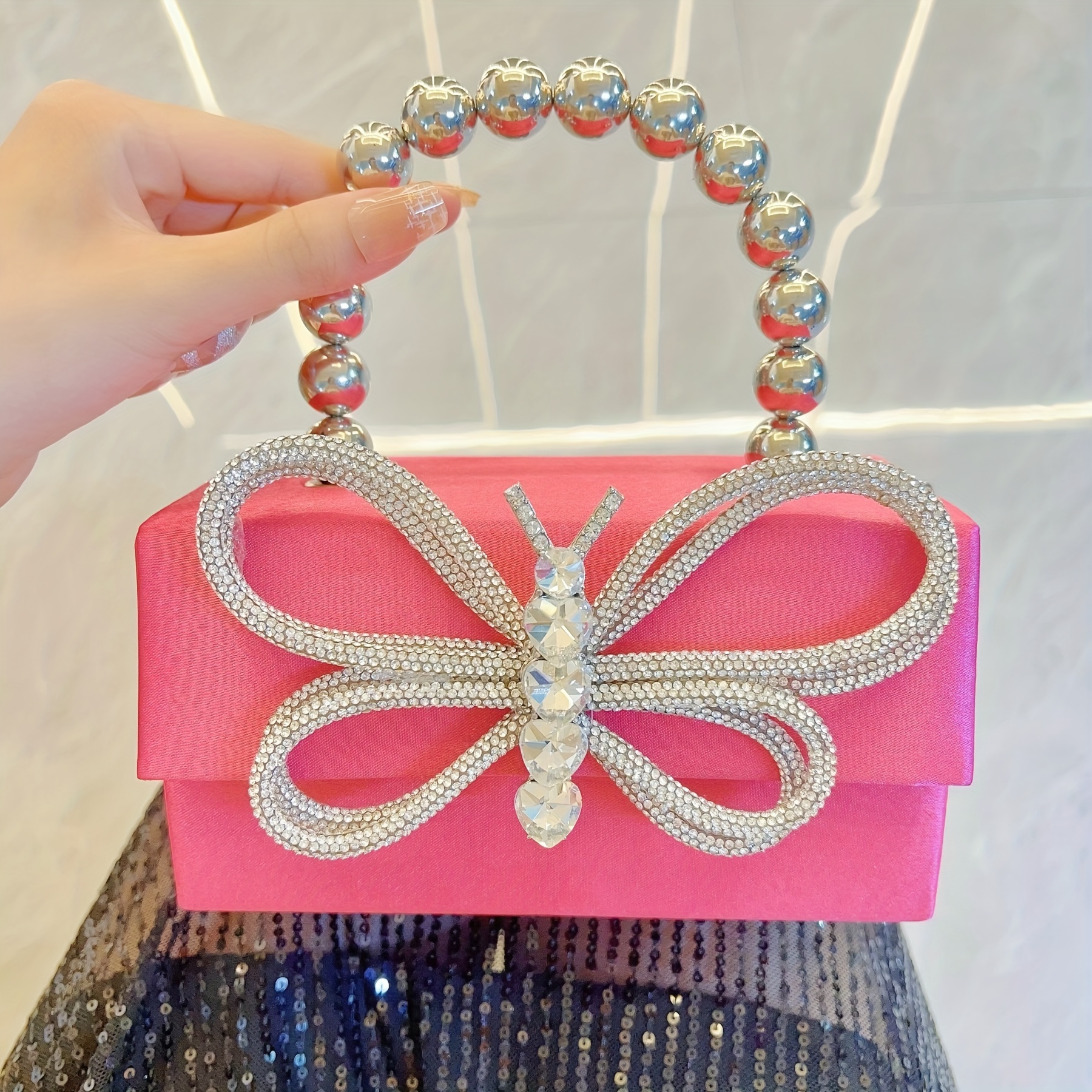 Avant-Garde Solid Pink Polyester Clutch with Sparkly Rhinestone Butterfly Embellishment