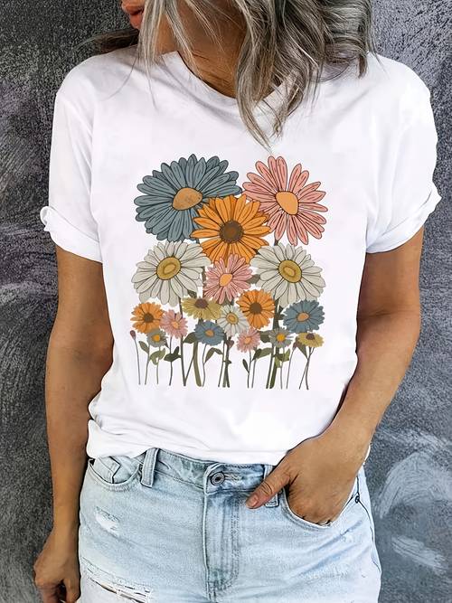 item picture a floral themed womens t shirt featuring a colorful of small daisies in colors such as orange and white designed with a soft short sleeved round neck for casual spring and summer wear