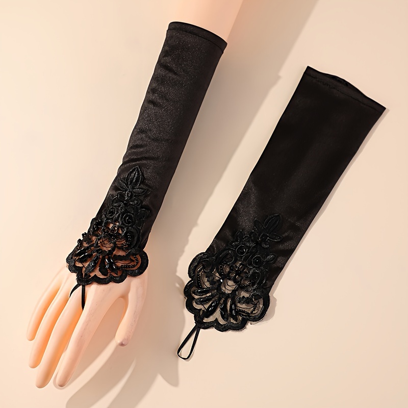 Image of Bridal Accessory Is A Pair Of Black Ring-style Long Gloves Suitable For Women's Wedding Parties