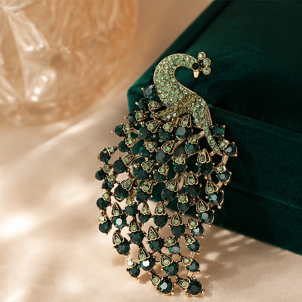 Image of Vintage Rhinestone Peacock Brooch With Classic Golden Accents, A Royal Vintage-style Jewelry Piece For Women. It Perfectly Adds A To Outfits And Is An Ideal Gift And Fashion