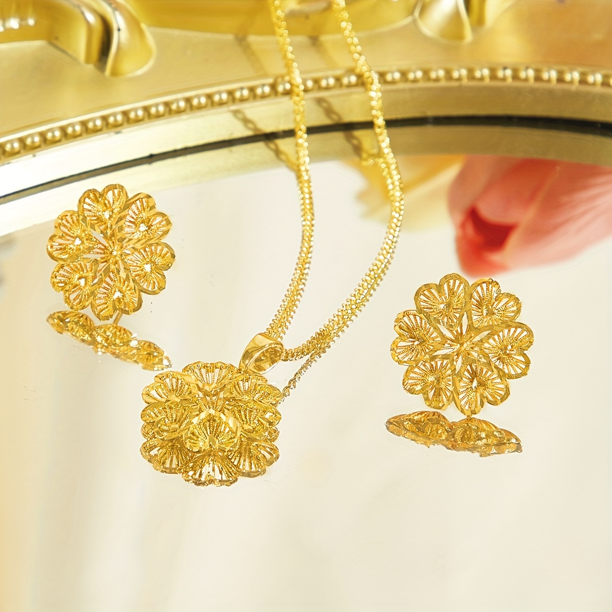 Image of A Set Of Exquisite Heart-shaped Hollow 3d Flower Earrings And Pendant Necklace In Golden, Suitable For Parties And Balls.