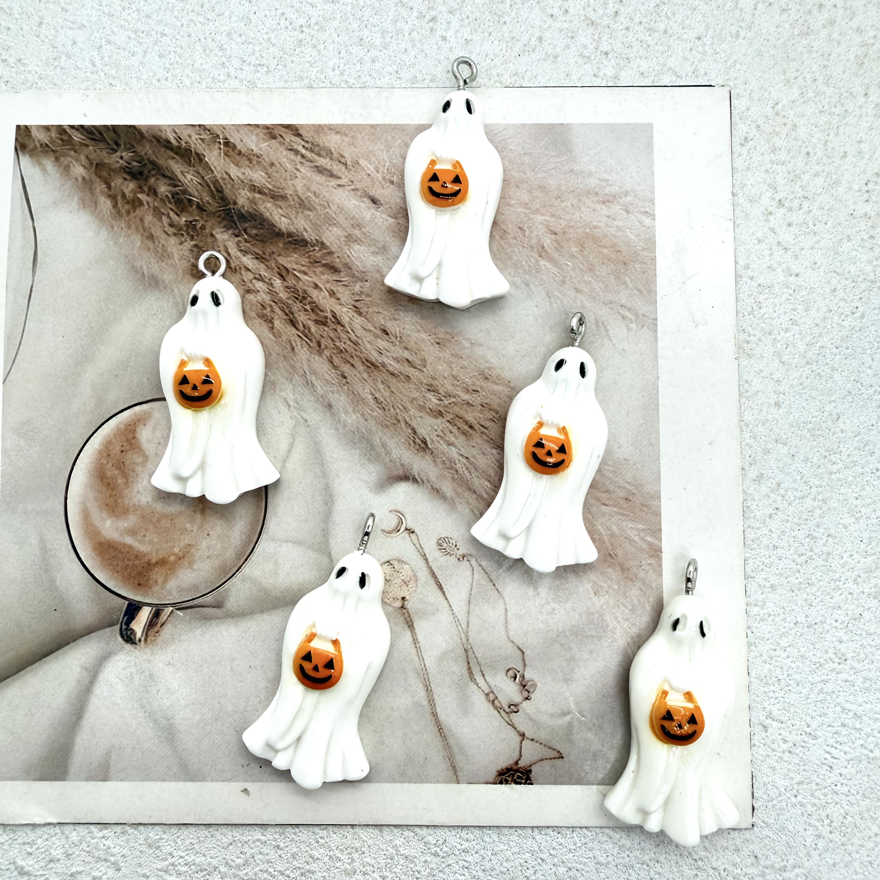 TEMU 12pcs/5pcs Resin Halloween White Pendants Holding Pumpkins, Suitable For Making, Perfect For Party Accessories, Earrings, Necklaces, Bags