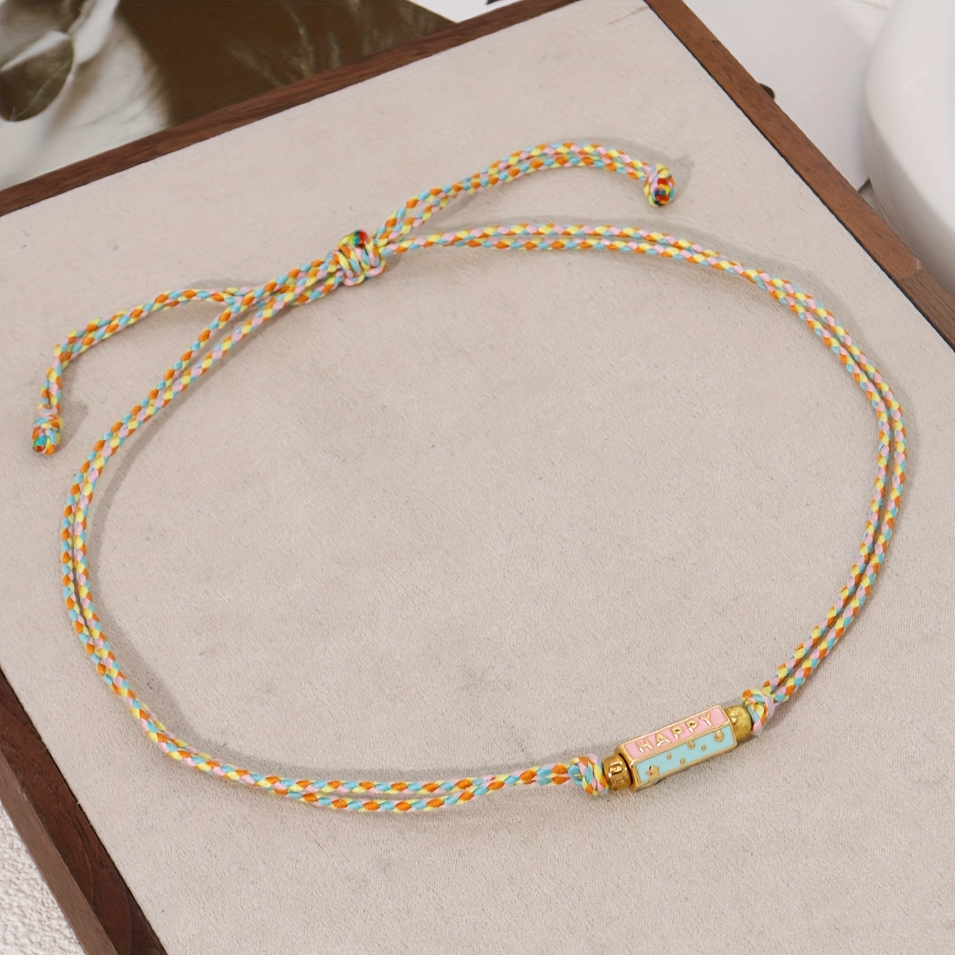 A Women's Stylish Line Necklace Featuring An Ethnic Metal Carved Letter, A Pendant With A Colorful Handmade Woven Design, Perfect For Party Holiday Jewelry Additions