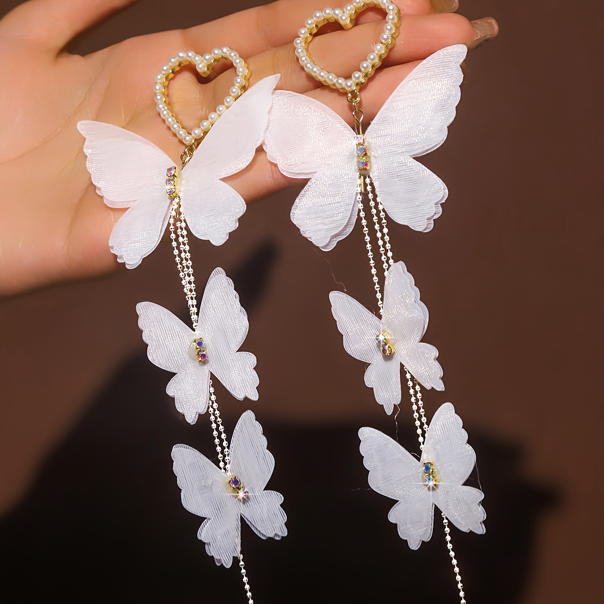 TEMU Une paire de boucles d'oreilles pour femme de cœur à trois niveaux en gaze dégradée avec pompon papillon, bijoux légers et délicats pour tenue