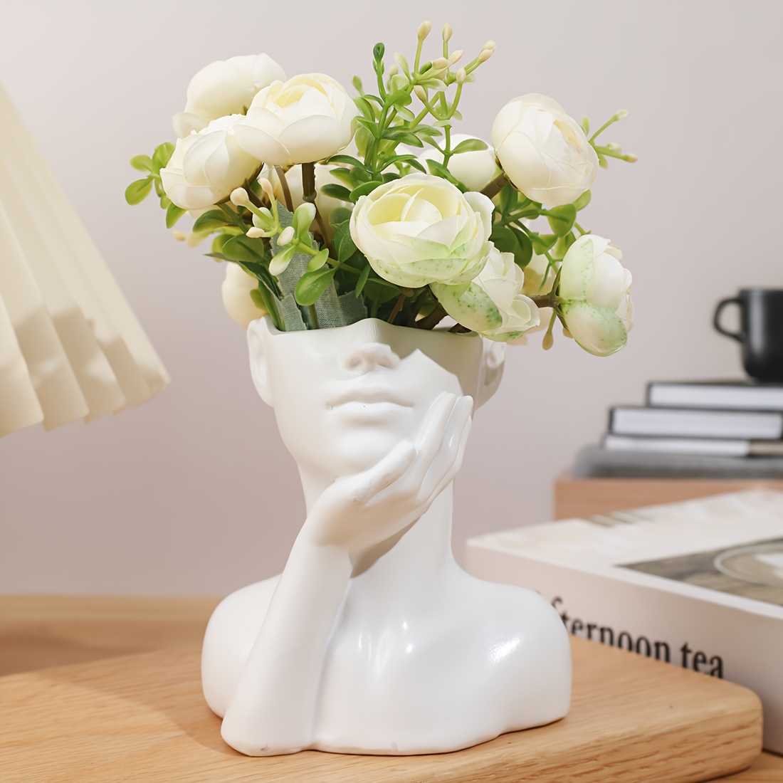 Image of A Decorative Piece That Serves As A Jewelry Holder In Of A Vase