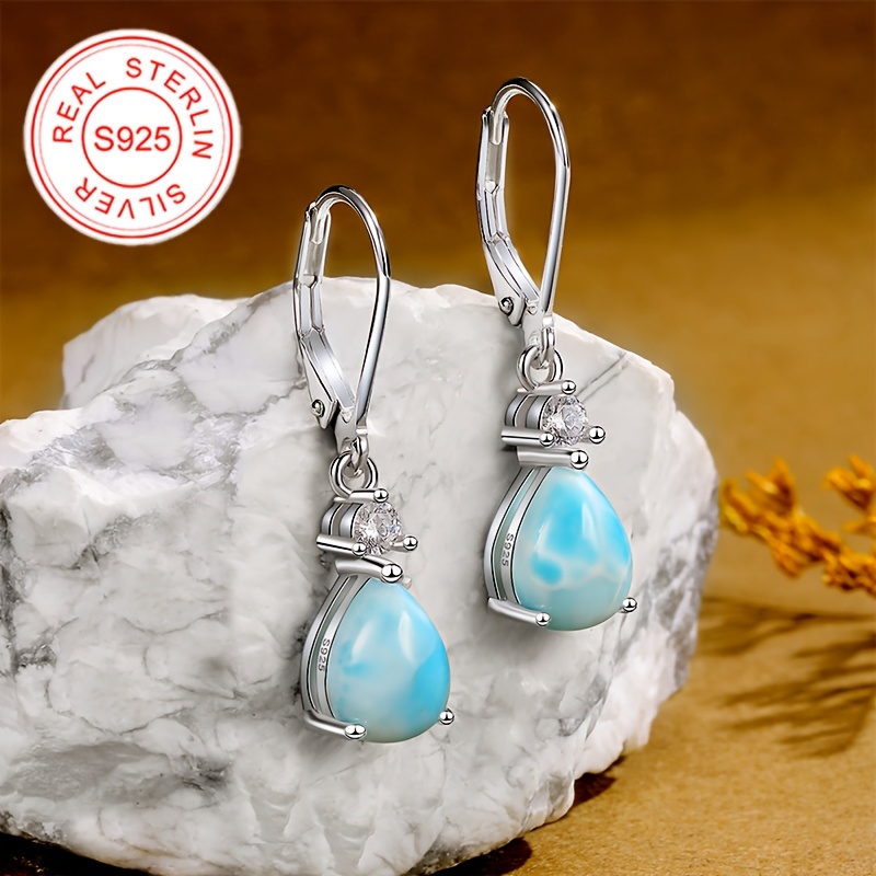 TEMU Earrings Feature Dangling Cubic Zirconia In A Teardrop Shape, From 925 Silver And . Ideal For Occasions Like Christmas, Weddings, And Birthdays
