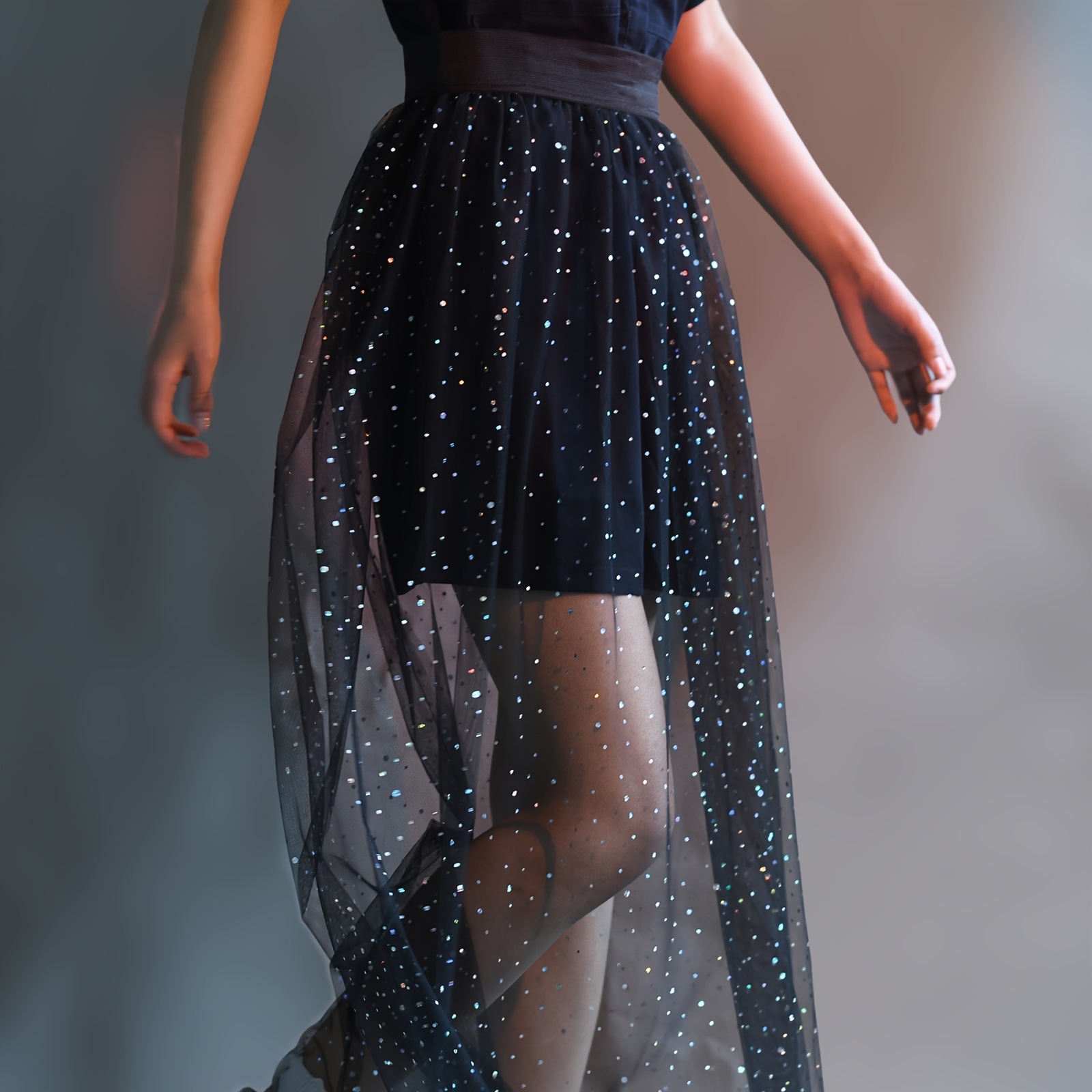 

A Black Mesh Midi Skirt With A Single-layer Lining, High-waisted Elastic Band, Long Skirt, Music Festivals And Parties.