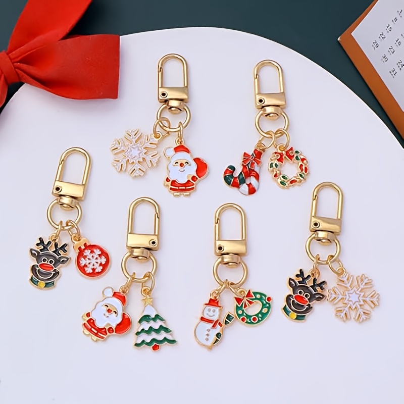 TEMU Set de 6 llaveros navideños, colgante Noel, renos, y , colgante de bolsa navideña de aleación con de aceite, corona navideña de caramelo, regalo