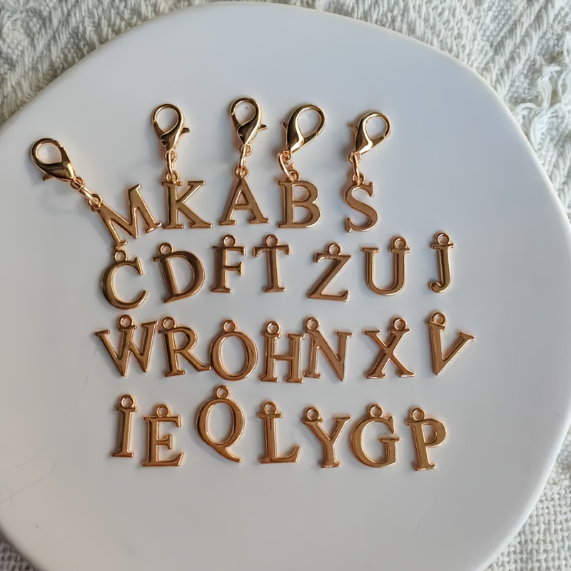 Image of A Set Of 26 Elegant Golden Metal Letter Keychains With Lobster Buckles, Suitable For Wallets, Backpacks And Car Keys - Ideal Gifts For Birthdays And Special Occasions - Combined With Multiple Letters