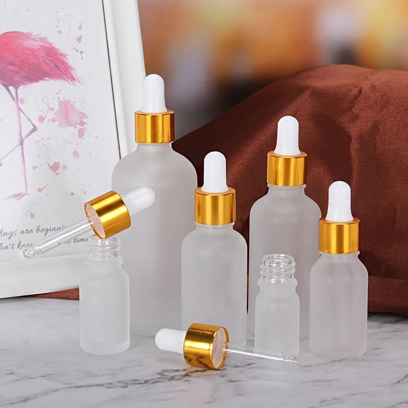 

A Frosted Essential Oil Bottle With A Capacity Of 5ml To 100ml, Featuring A Transparent Dropper For Cosmetic Serum Distribution.