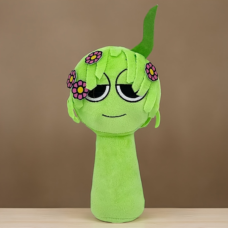 pupazzo peluche personaggio cartone verde Temu Italy