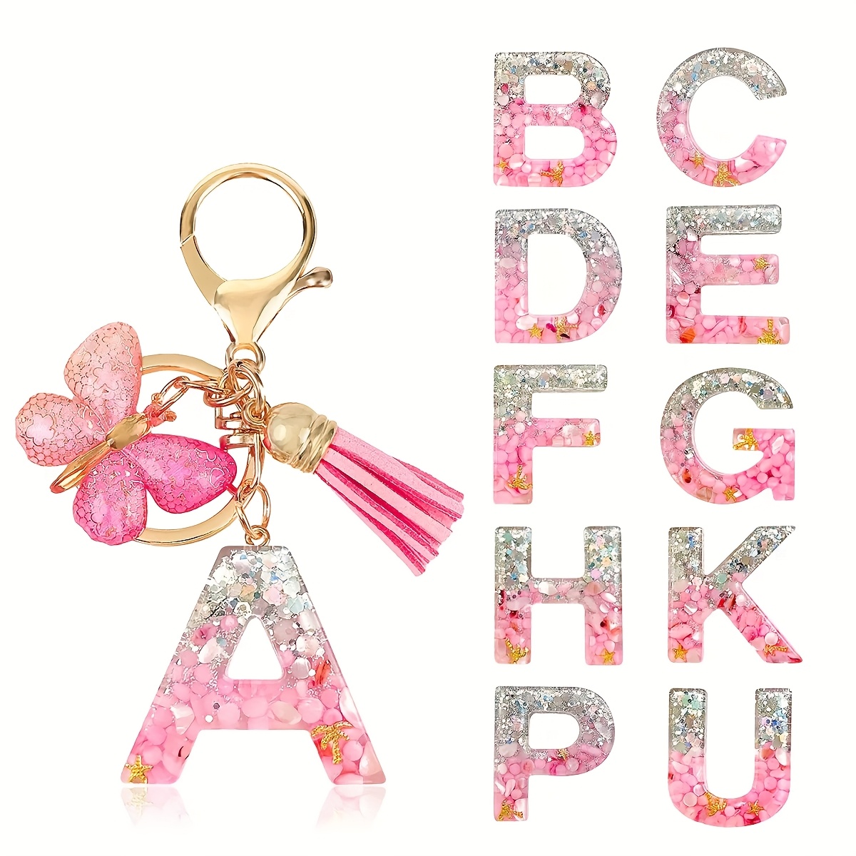 one   keychain featuring a key ring with glitter and a   tassel pendant   hanging on bags and suitable for car keys and womens purses