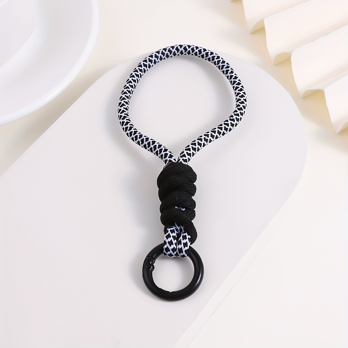 Colorful Lanyard Keychain With A Short, Braided Design Featuring A Knotted Pattern