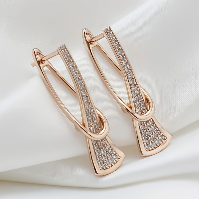 Image of A Set Of Women's Stylish Dangle Earrings Featuring Synthetic Zirconia In A , Perfect For Elegant Occasions And Casual Parties