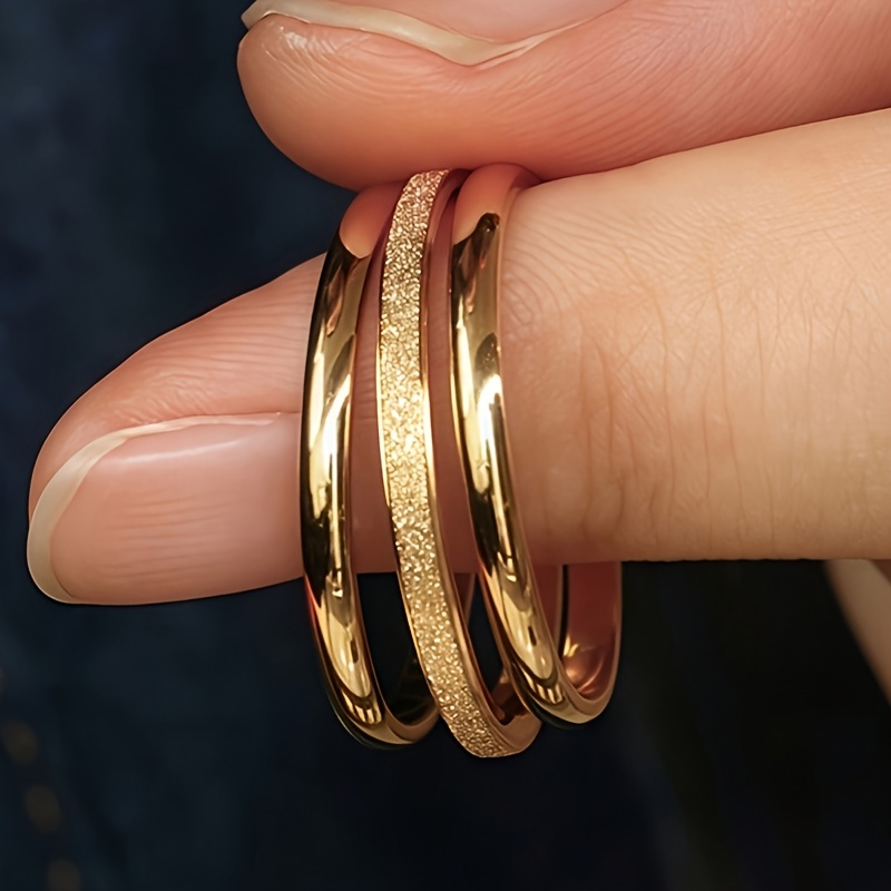 A Set Of 3 Women's Rings Made Of 18k Gold-plated Stainless Steel, Featuring Thin Bands With Of Glossy And Matte . Low-allergy
