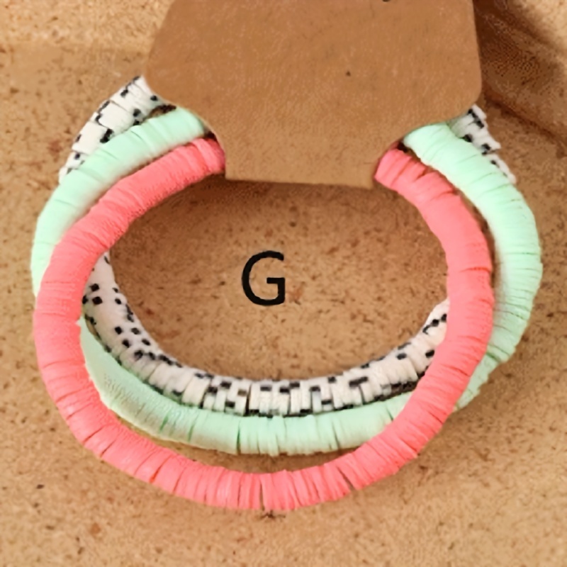 Image of A Set Of Soft Clay Bracelets For Men And Women, Featuring Stylish Multi-colored Designs For Women, Without Any , Party-style Accessories, And A Beach Vacation-themed Wristband Set.