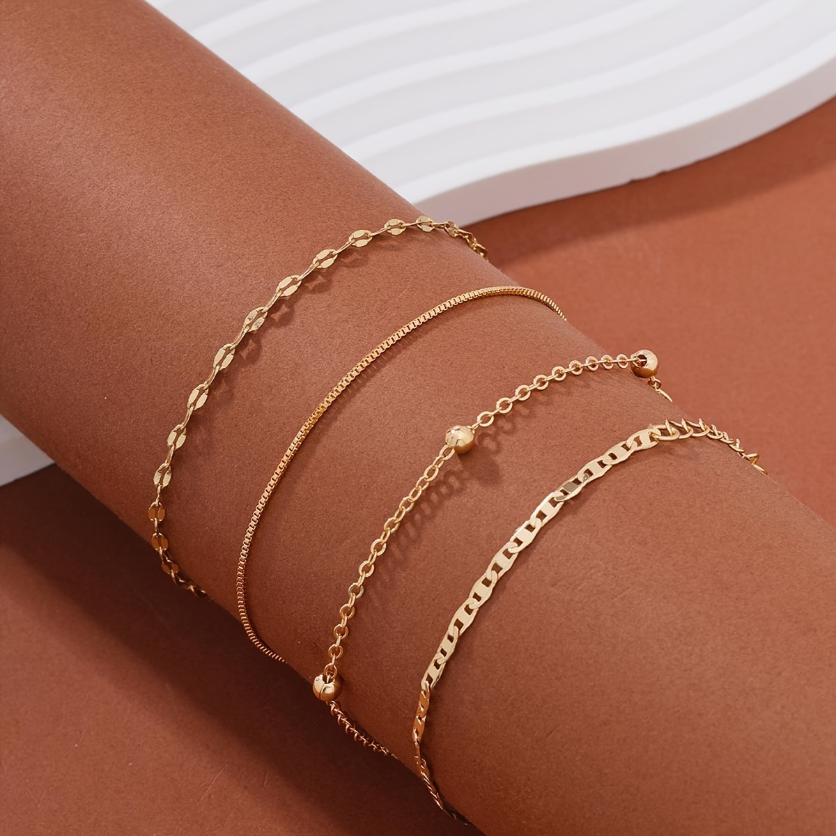 

4 Pcs Set Of Tiny Thin Golden Chain Design Bracelet Alloy Jewelry Bohemian Leisure Style For Women Stackable Hand Decor