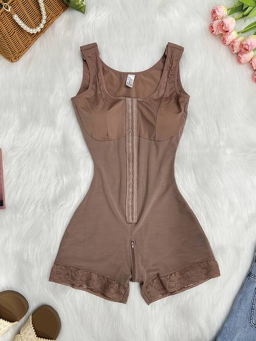 this 1pc shaping suit is designed to the abdomen lift the and tighten the legs it features a wide shoulder strap and front buttons for body shaping