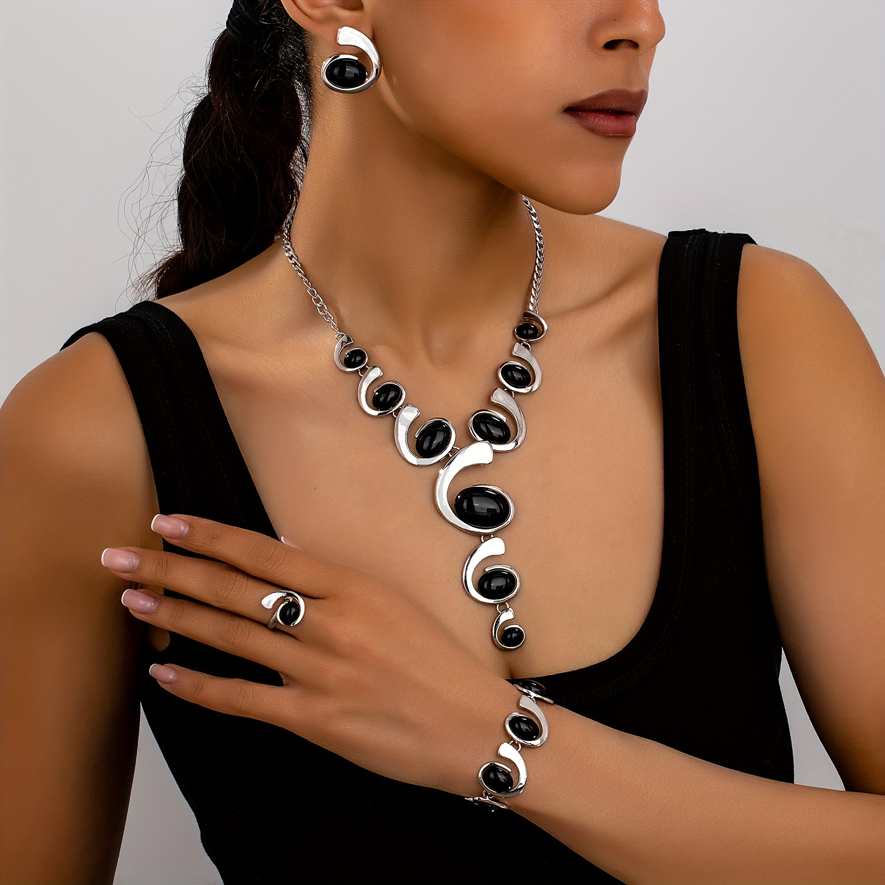 Image of 4pcs/set Women's Fashion Easy Bohemian Style Geometric Oval Black Inlaid Spiral Spliced Bead Necklace Earrings Bracelet Ring Set