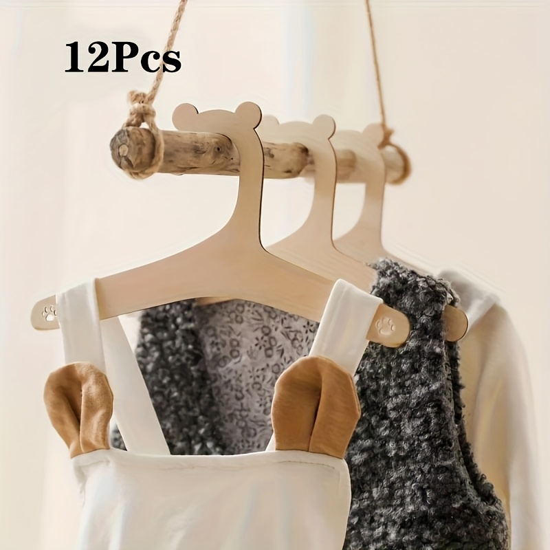 Image of Set Of 12 Bear-shaped Wooden Hangers Suitable For Clothes, Pet Apparel, And Additions - Featuring A Smooth, Durable End, Ideal For Storage In Bedrooms, Wardrobes, And