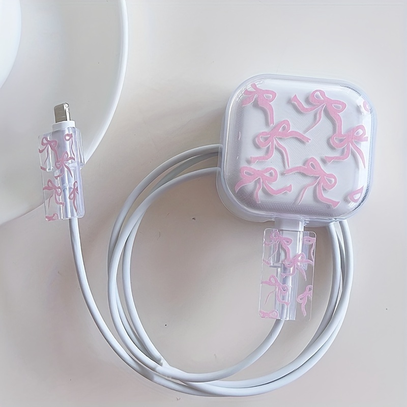 E-shop Eine transparente Schutzhülle für ein Ladegerät mit einem rosa Schleifenmuster, geeignet für die Hong Version 20W Datenkabel, um das Ladekabel