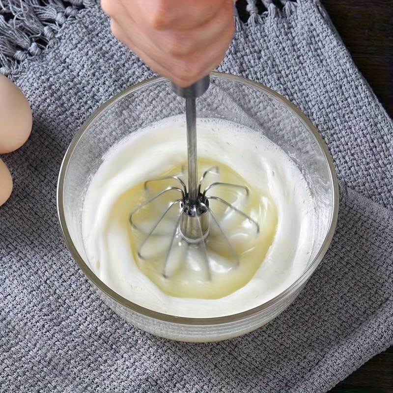   cordless manual hand mixer with metal whisk   for blending whipping cream and beating eggs ideal for baking and cooking   modern kitchen tool durable construction whisk attachment