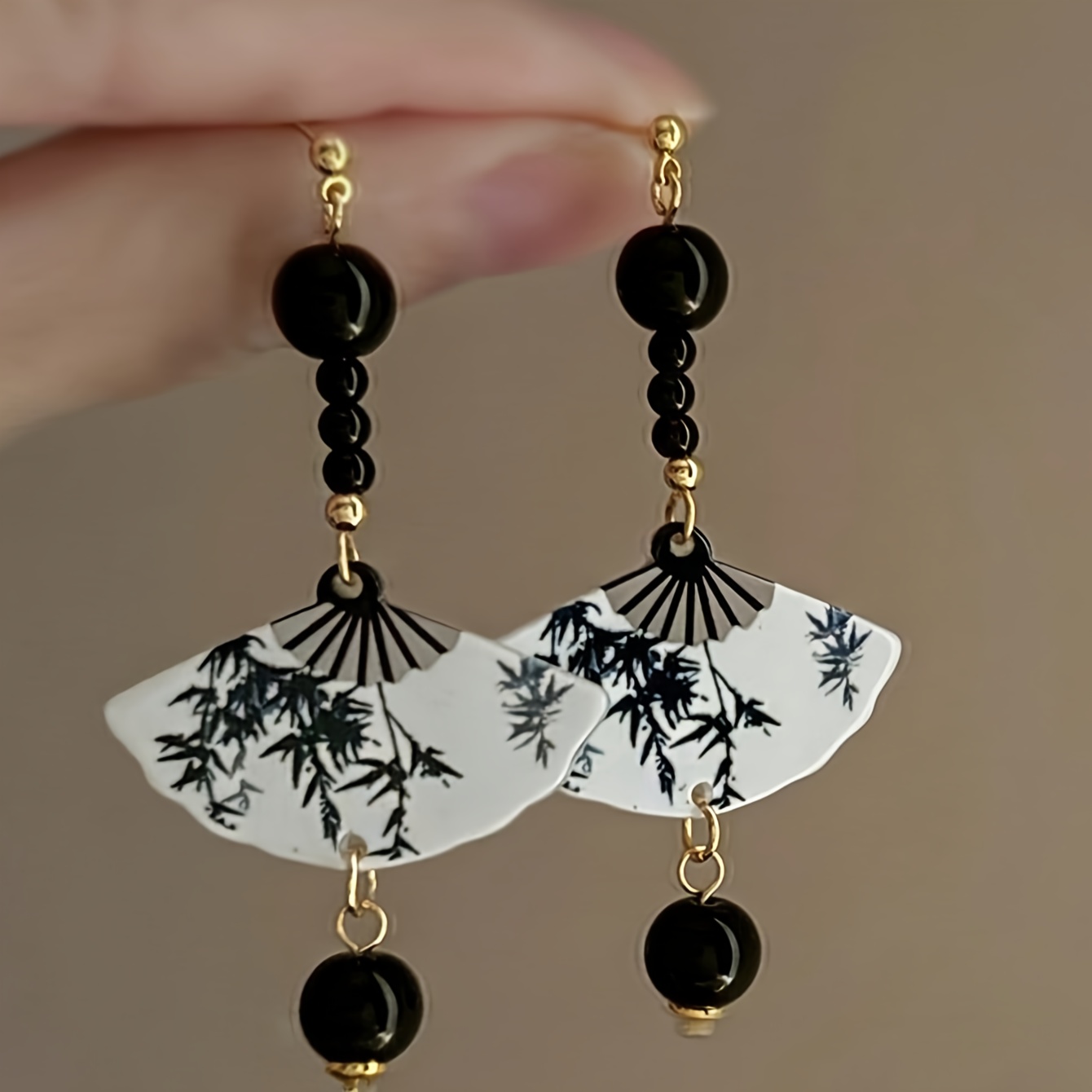 

Fashionable Retro Chinese Style Long Silvery Needle Ink Painting Fan Shaped Resin Earrings For Women