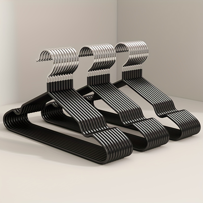 wyx hangers are elegant and modern metal clothing hangers featuring a non slip   for a minimalist home aesthetic details 1