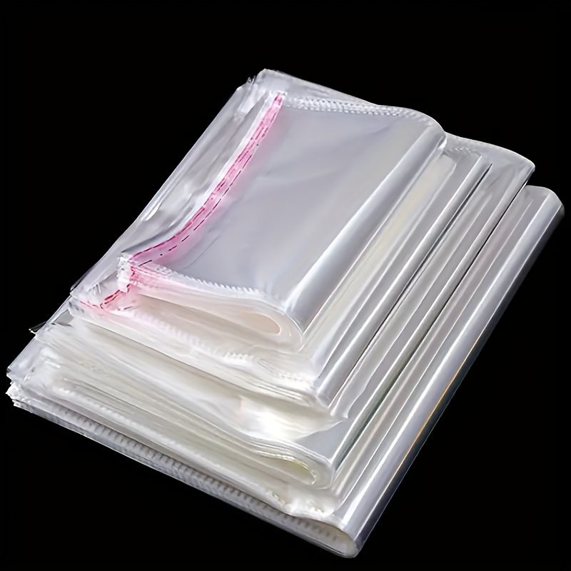 

100pcs Transparent Resealable Cellophane Self-adhesive Sealing Bag, Durable Plastic Cello Bag, T-shirt Printing Photo Gift, Self-sealing Opp Bpp Bag