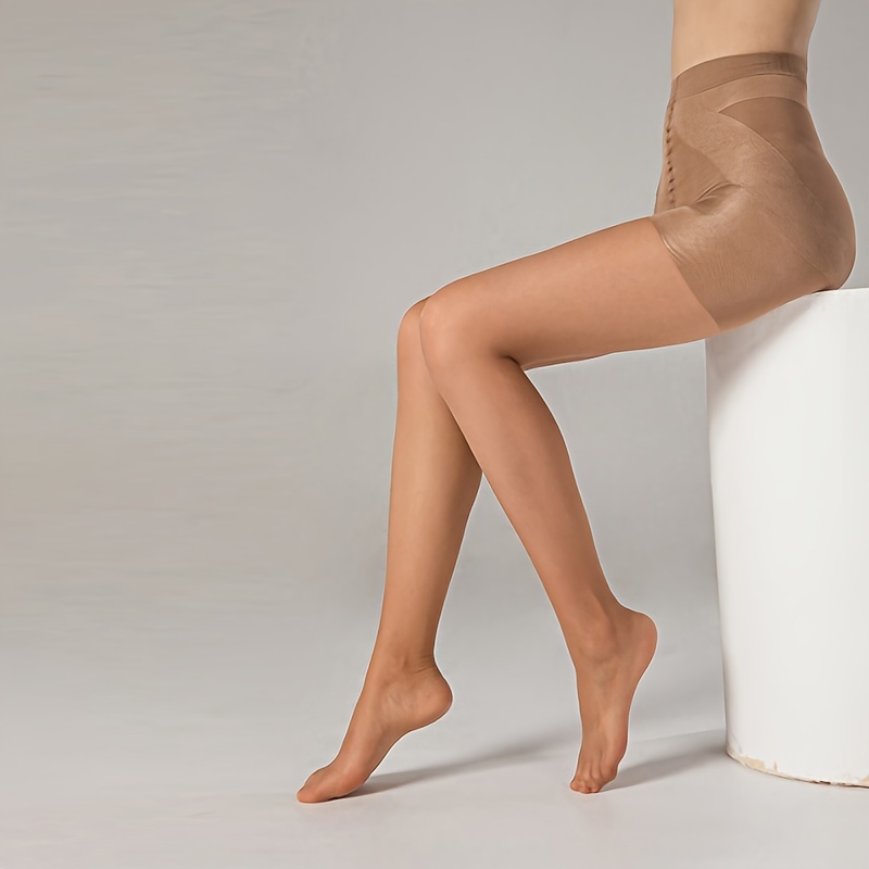 Apricot-colored slim-fit compression stockings for shaping and beautifying legs