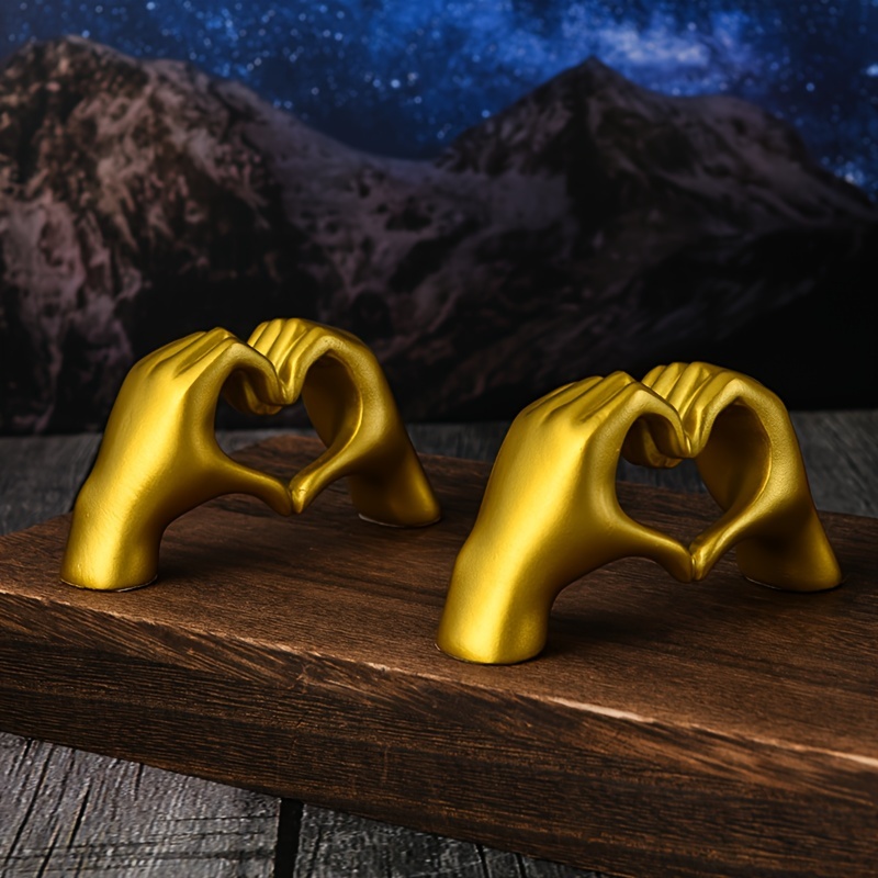 

Golden Heart Hand Sculpture: Resin Art Decoration For Office Or Home - Perfect Gift For Loved Ones