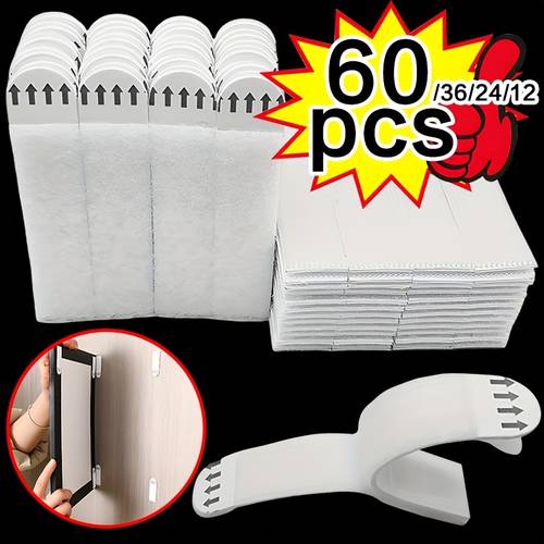 heavy duty picture hanging strips leave suitable for securing frames and posters on smooth like glass and wood making them an for decorating the walls of living rooms bedrooms or offices