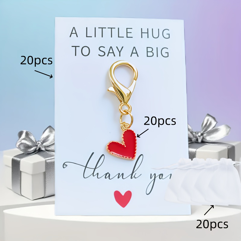 E-shop 60-teiliges Schlüsselanhänger-Set – Goldener Tränenstropfen mit rotem Herz-Anhänger, dekorierte Kopfhörer-Accessoires, Business-Geschenkset: 20