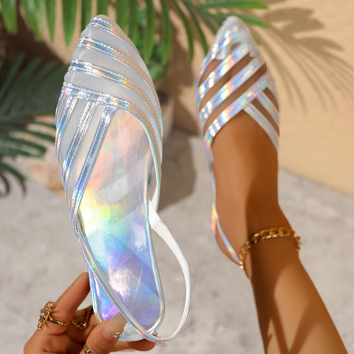 a pair of high quality silvery mesh lace paneled flat sandals with   laser colored straps suitable for outdoor activities dates parties and   occasions beautiful fashionable and   pointed toe sandals women shoes