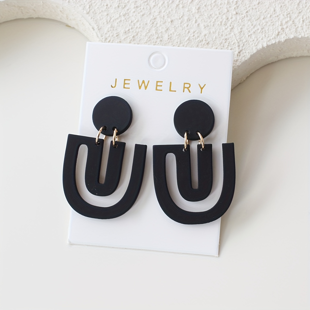 Image of A Pair Of Women' Earrings, Featuring Vintage Hollow U-shaped Black Acrylic Design, With A And Elegant Clay Texture, Wear, Parties, Vacations, And Holiday Gifts