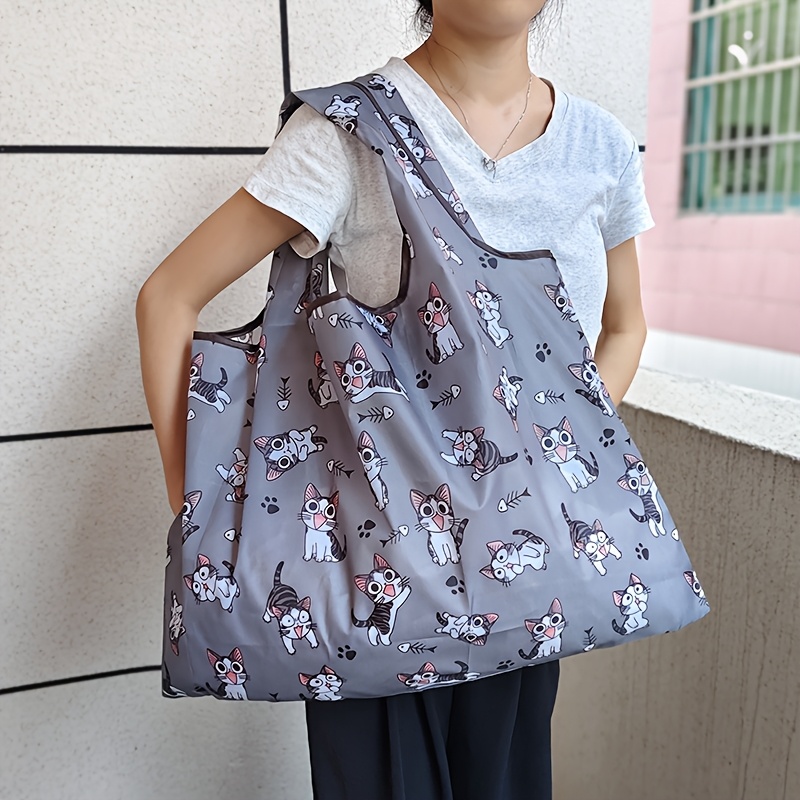 TEMU Fashionable Large Capacity Cat-themed Tote Bag - Lightweight, Foldable, And Durable Oxford Fabric, Featuring A Cartoon Cat On A Gray Background,