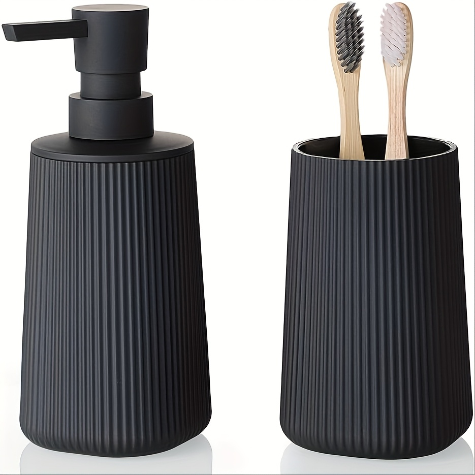 Striped Black Set Of Two: Soap Dispenser And Toothbrush Holder.