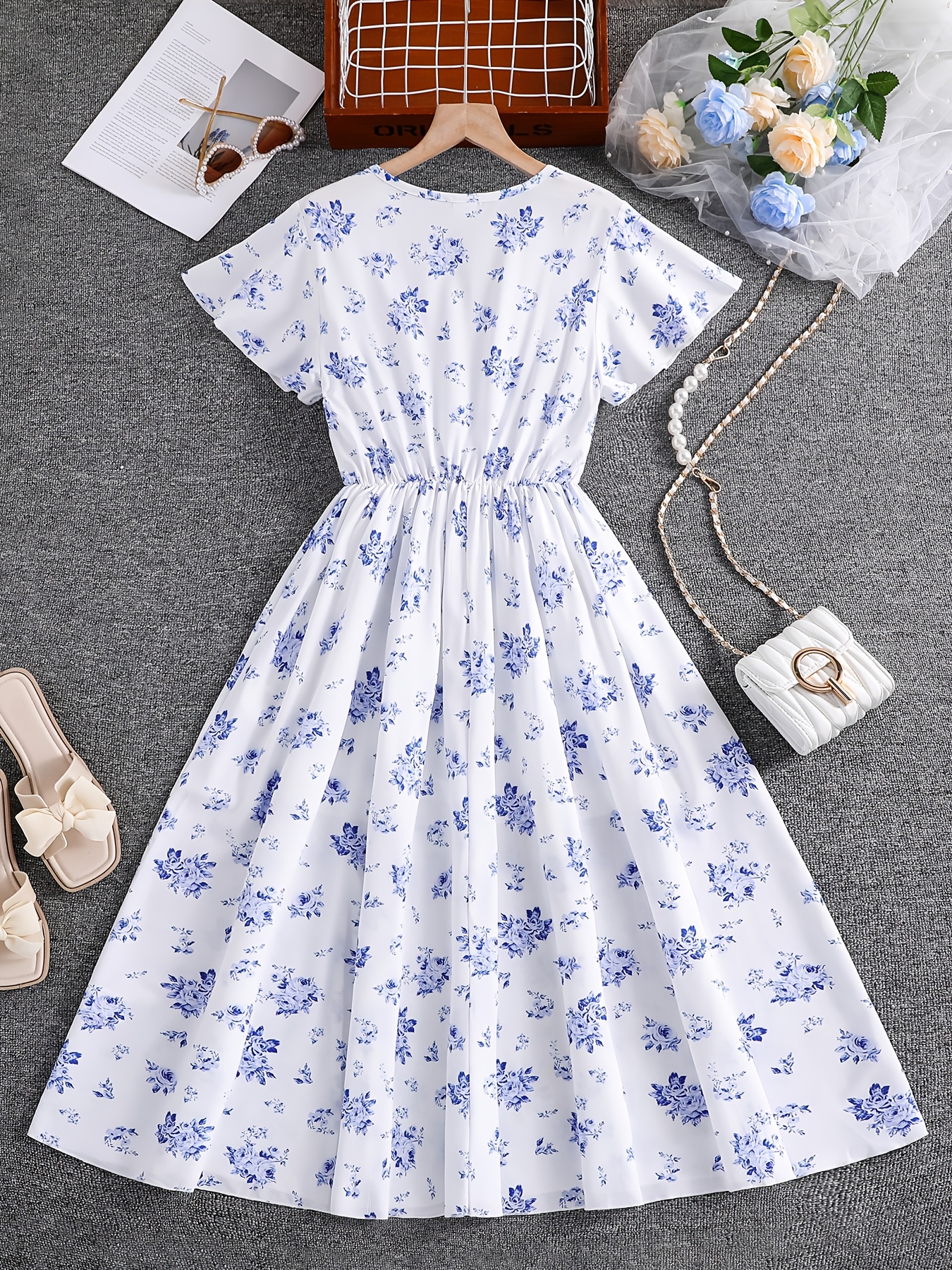 white chiffon dress with blue flowers Zapaka Women Stylish White Blue Flower Chiffon Bridesmaid Dress with Slit A-Line Tea Length Wedding Guest Dress, White Blue Flower / AU6