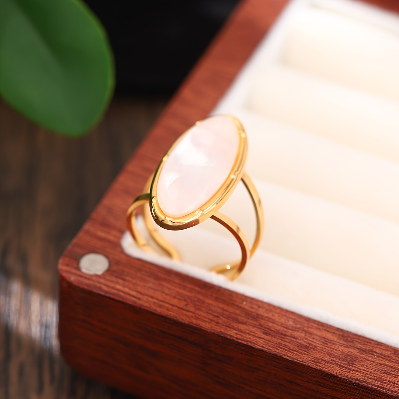 A unique stainless steel ring from the collection, featuring a luxurious vintage French ring in golden white, made of colorful natural white pearl and resin. The open design is adjustable and fade-resistant, with a simple and refined design in two styles.