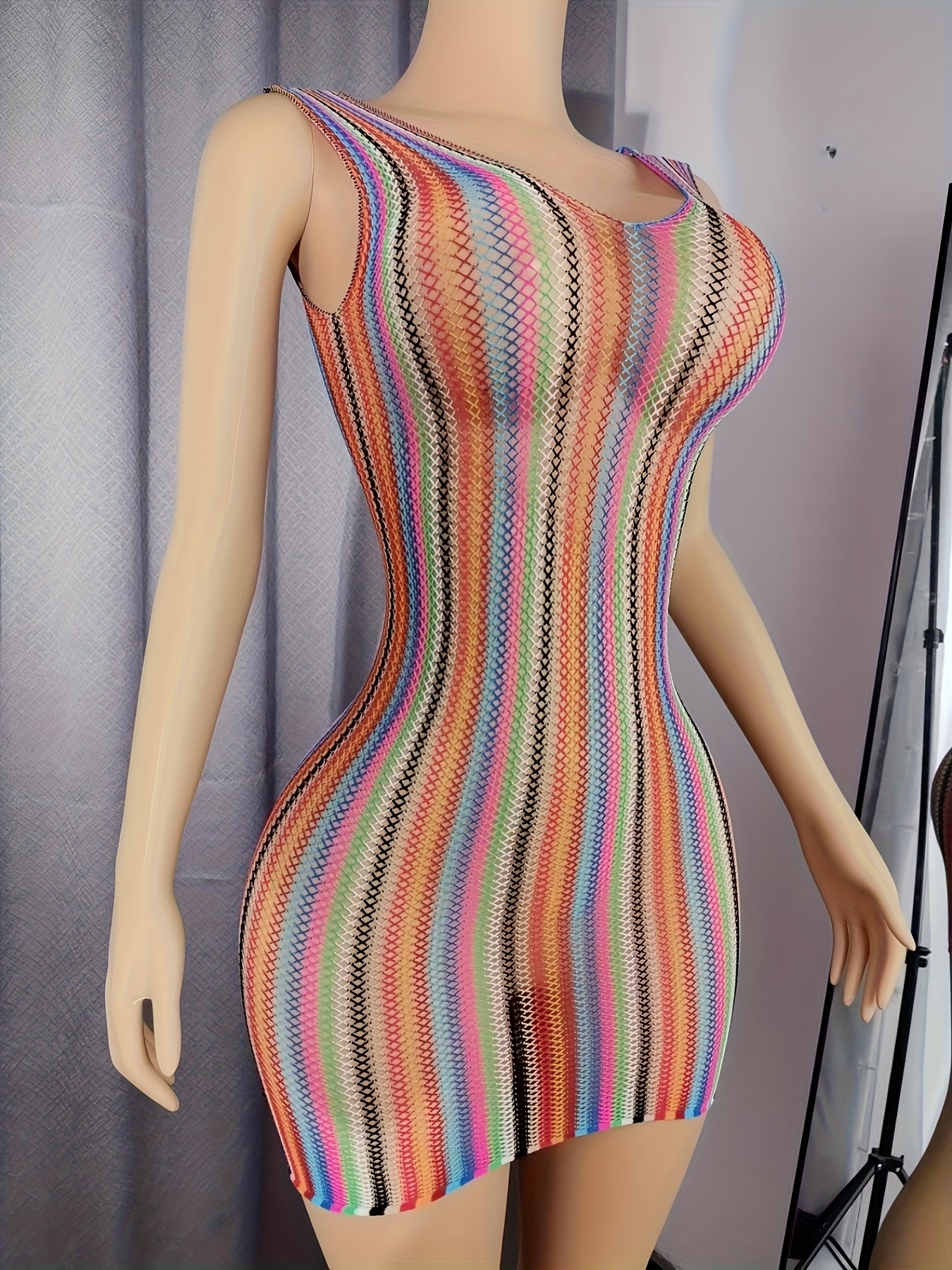 A * Plus-Size Women'* Striped Fishnet Cover-Up - a Sheer Hollow Beach  Outfit Suitable for Music Festivals.