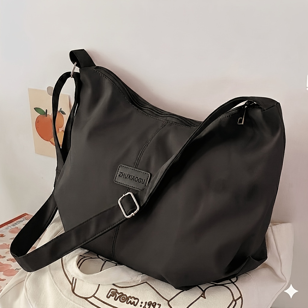 Image of Stylish Autumn/winter Large-capacity Dumpling-style Japanese-inspired Solid For Women, Versatile Nylon Multi-pocket Shoulder Bag, Crossbody Bag For Students, Commuting, And School