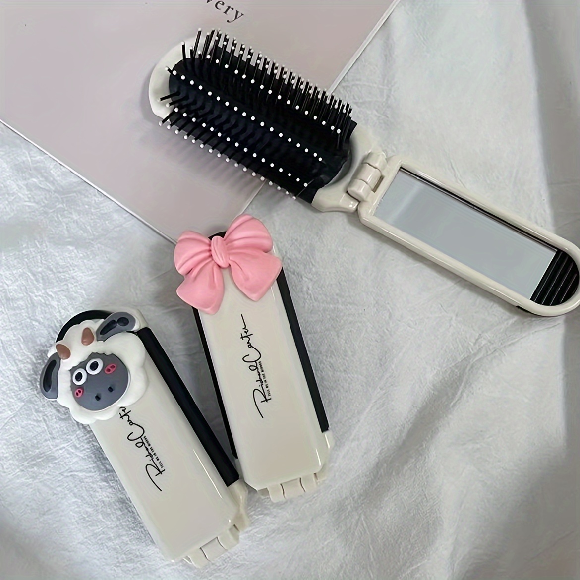 

1pc Folding Hair Comb, Airbag Hair Brush With Mirror, Scalp Massage Brush, Lovely Bowknot Decoration Comb, Cute Cartoon Sheep Decorative Comb Portable Hair Styling Tool
