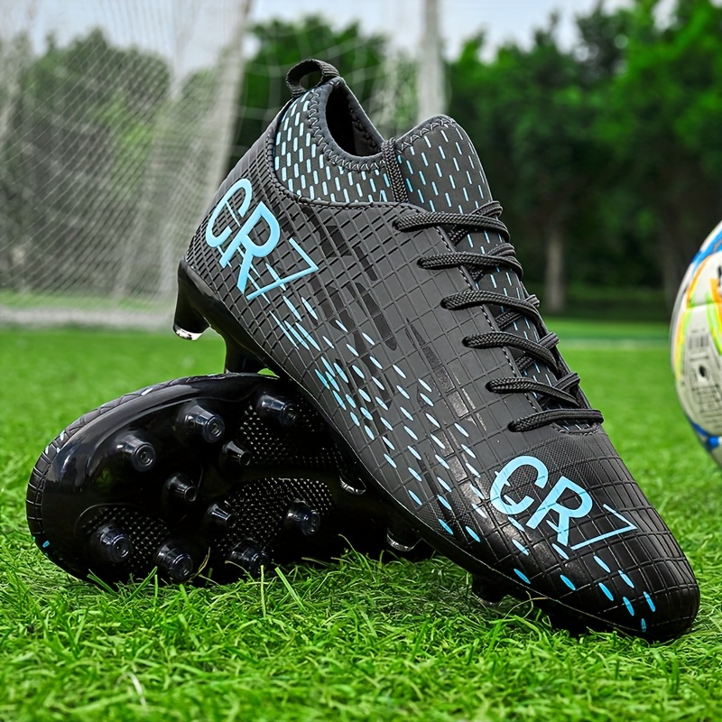 black and blue football cleats