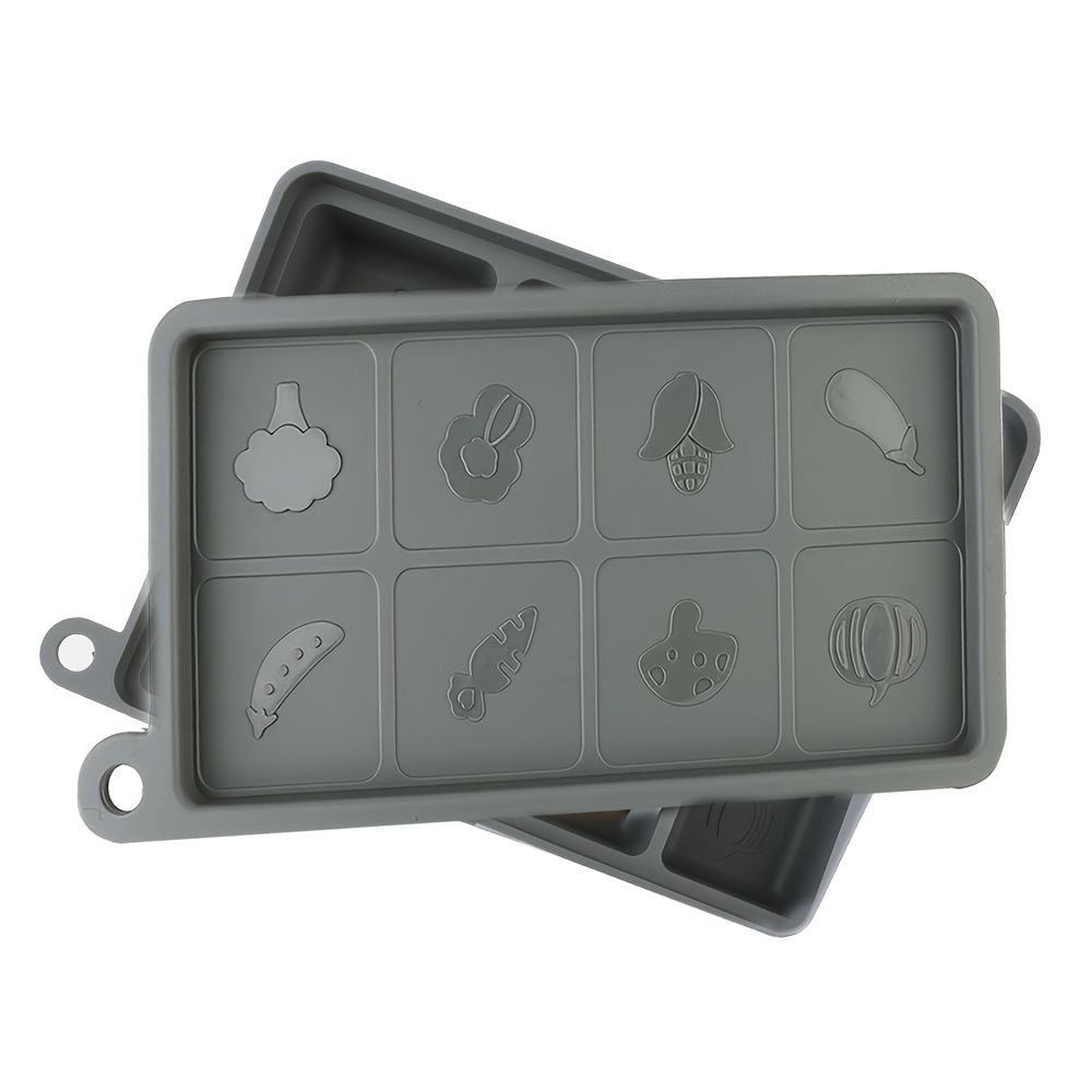 A Large Gray Silicone Cube Of Ice Tray With 8 Compartments And A Removable Lid - Reusable, Drinks Cool - An Essential Kitchen Tool