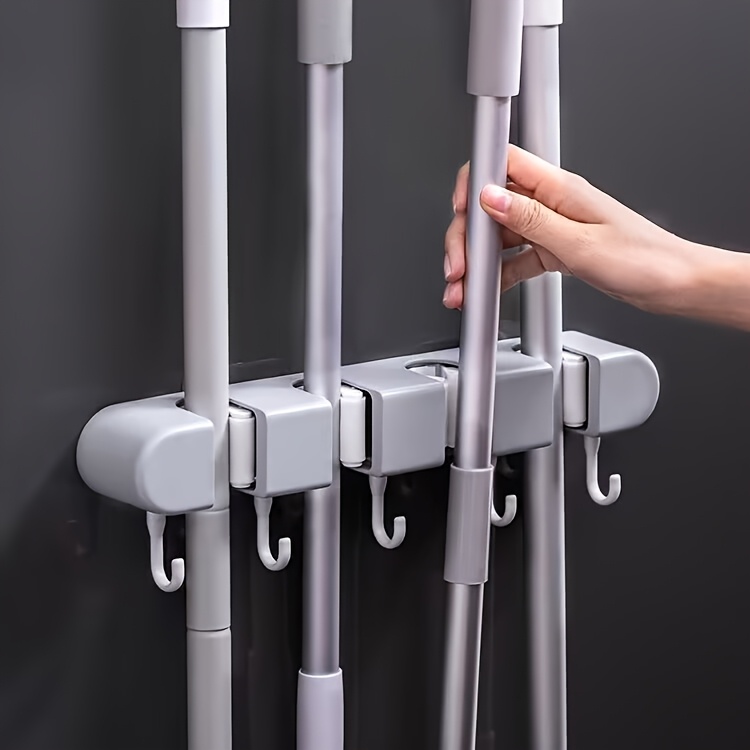 wall mounted mop and broom holder no drill   organizer with flexible silicone clips multi use plastic storage rack for bathroom   saving   sleek gray   cleaning tool holder   durable plastic rack details 0