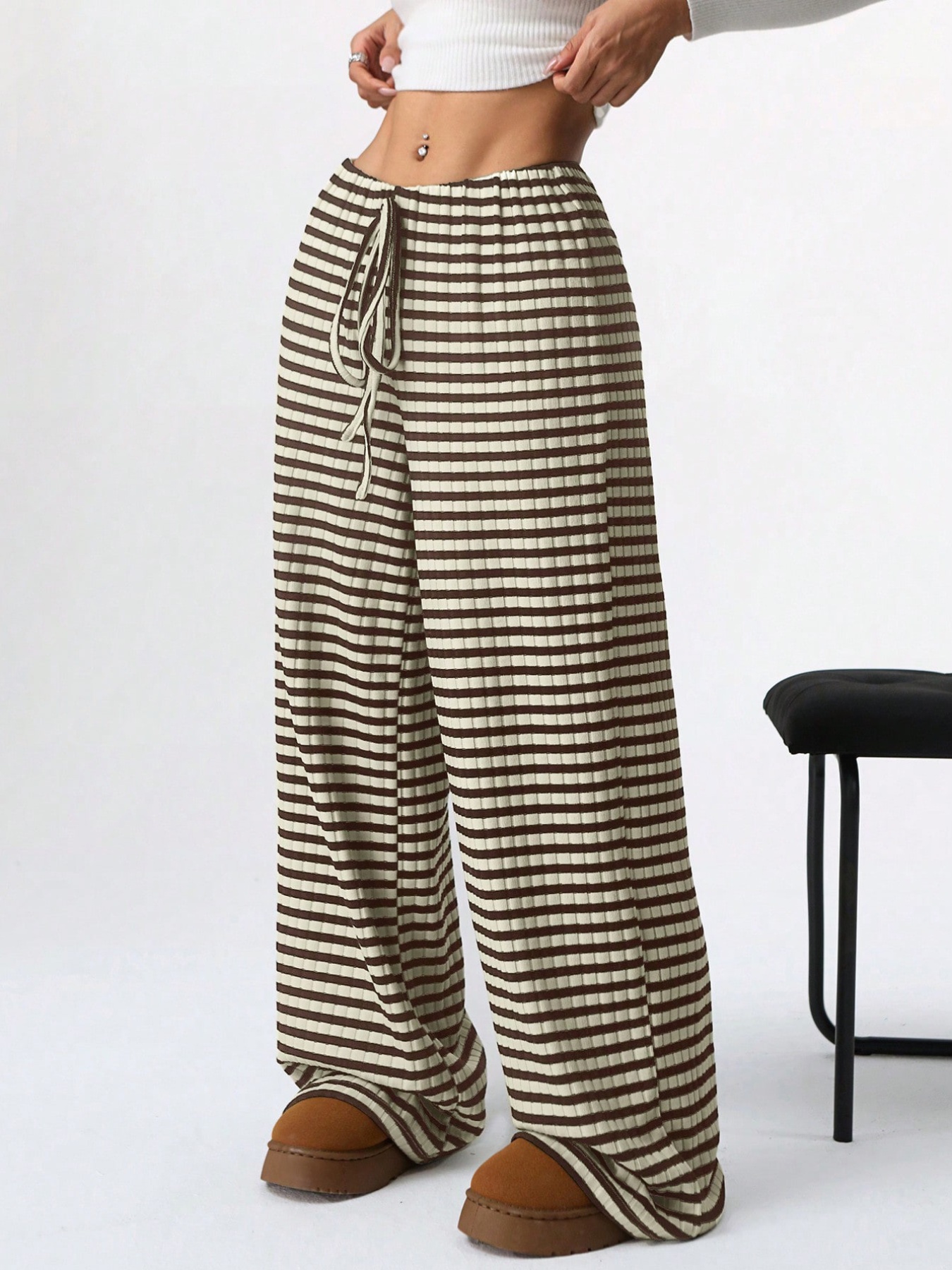 black and striped pants sold on Temu United States