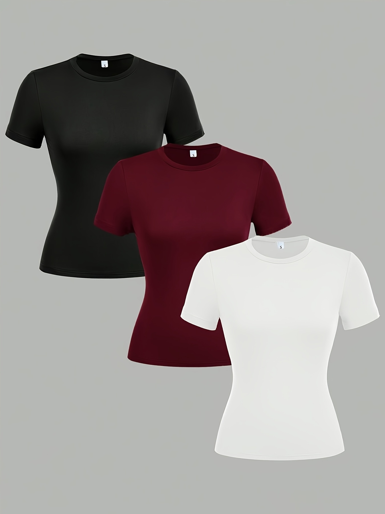 A New Set of Three Stylish Short-Sleeve Fitted Tops in Various Colors, Perfect for Wearing in Spring, Summer, And Autumn