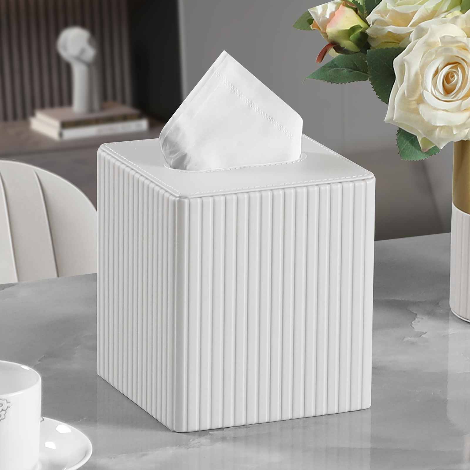   tissue box in elegant colors made of pu leather featuring a magnetic closure at   with a striped decorative surface suitable for bathrooms bedrooms or offices Product details 5